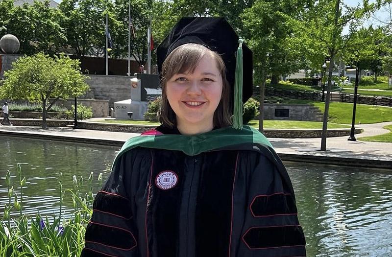 RARE Scholars program alum Olivia Cummings in graduation cap and gown